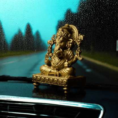 Ganesh ji on chowki- Car dashboard.