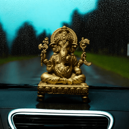Ganesh ji on chowki- Car dashboard.