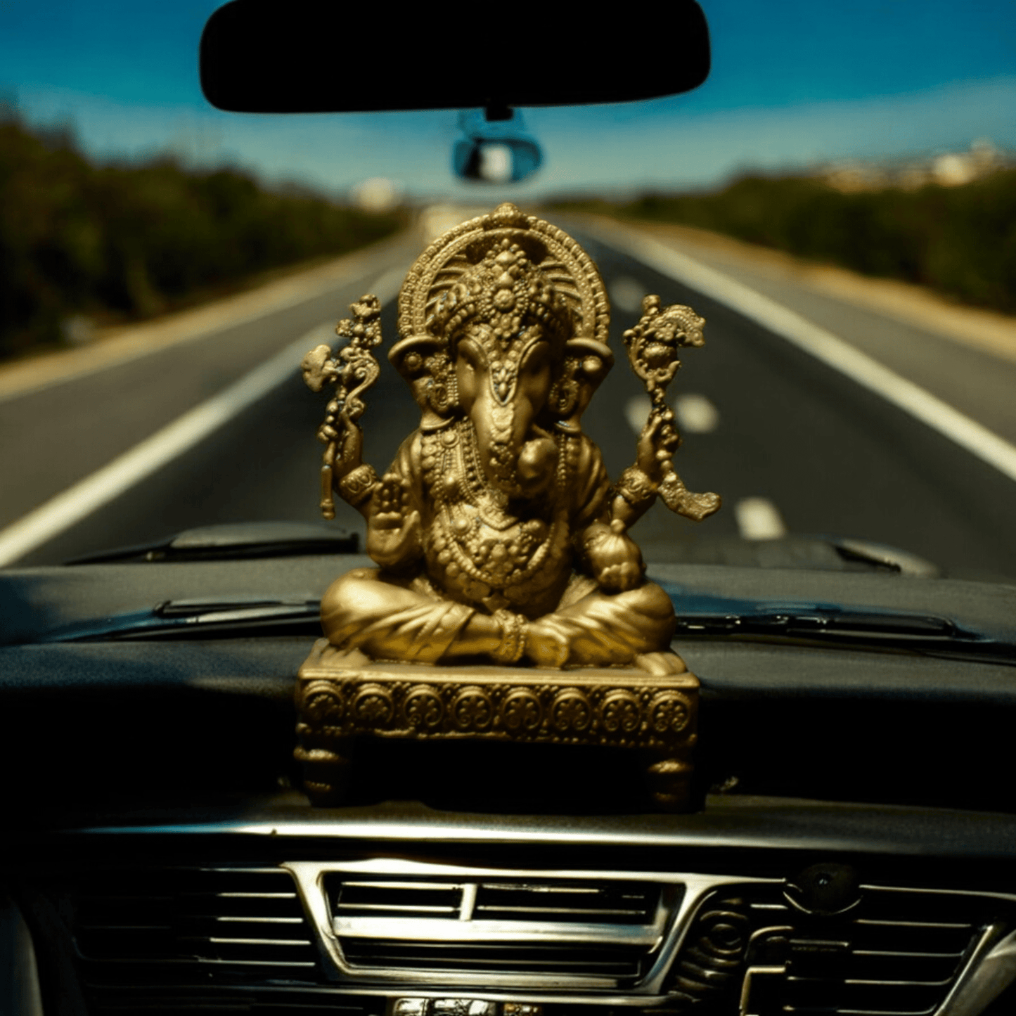 Ganesh ji on chowki- Car dashboard.