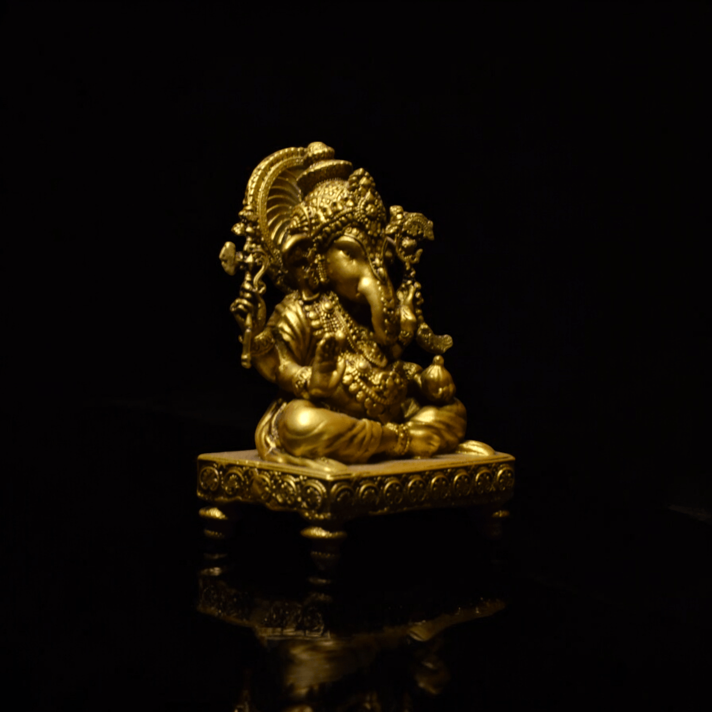 Ganesh ji on chowki- Car dashboard.